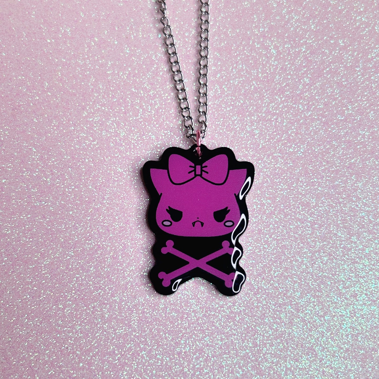 bitten crossbones necklace