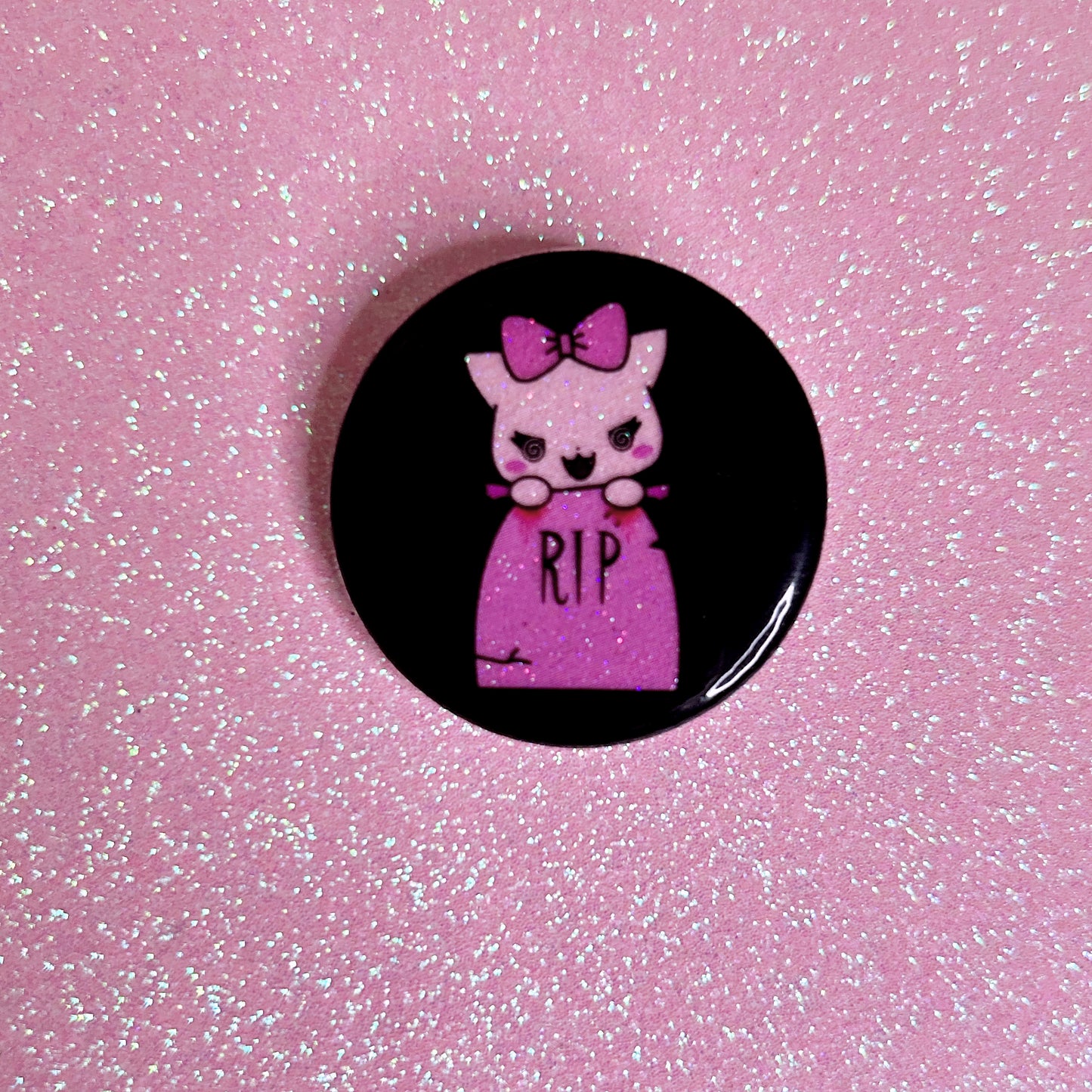 bitten’s tombstone glitter button